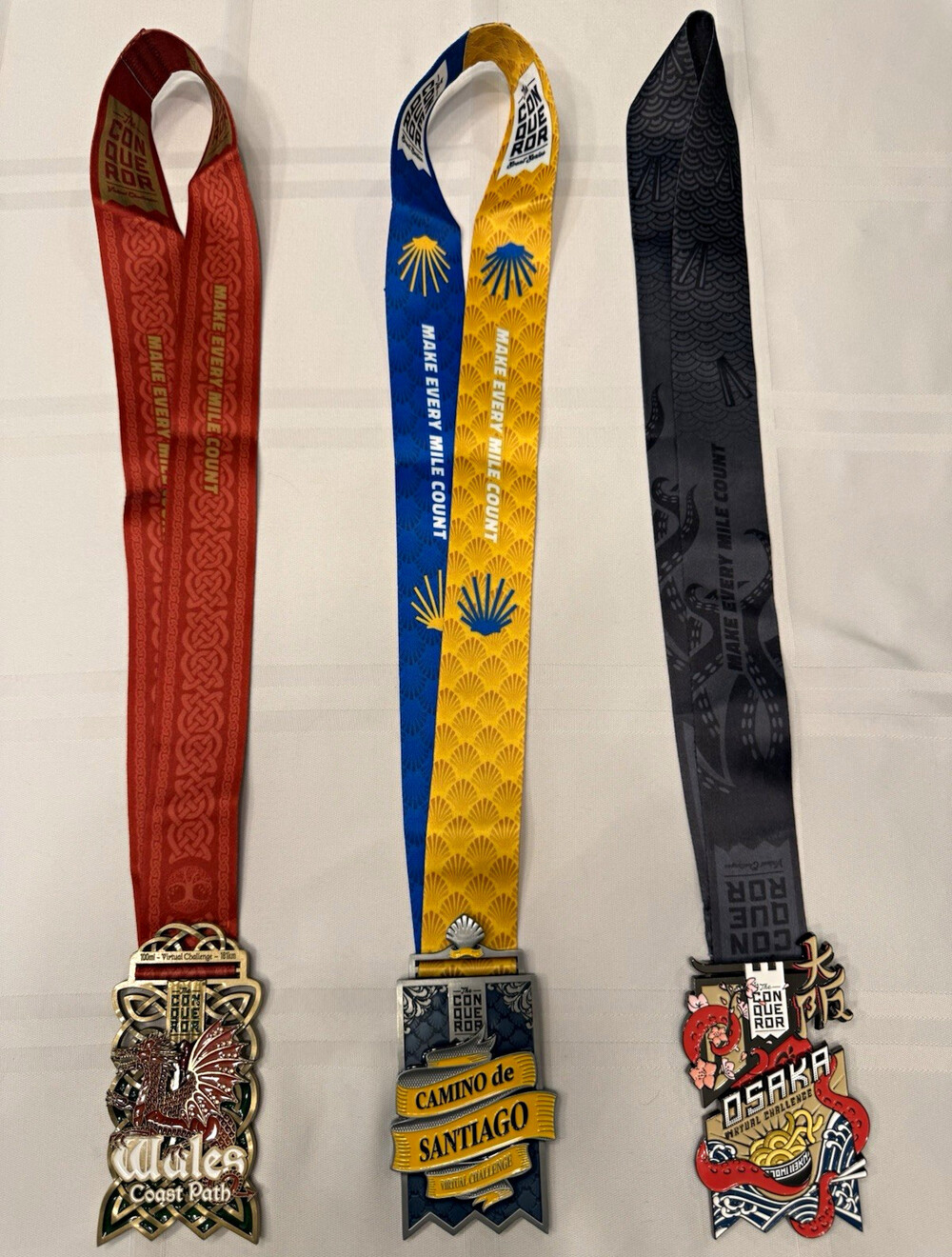 The Conqueror Virtual Challenge Medals Lot of 3: Wales Santiago Osaka